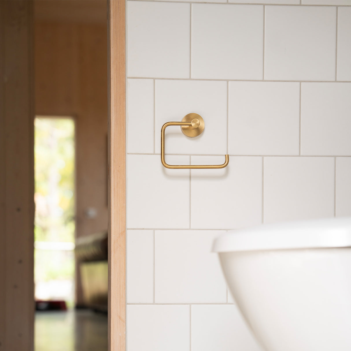 Smedbo House Toilet Roll Holder in Brushed Brass lifestyle 2