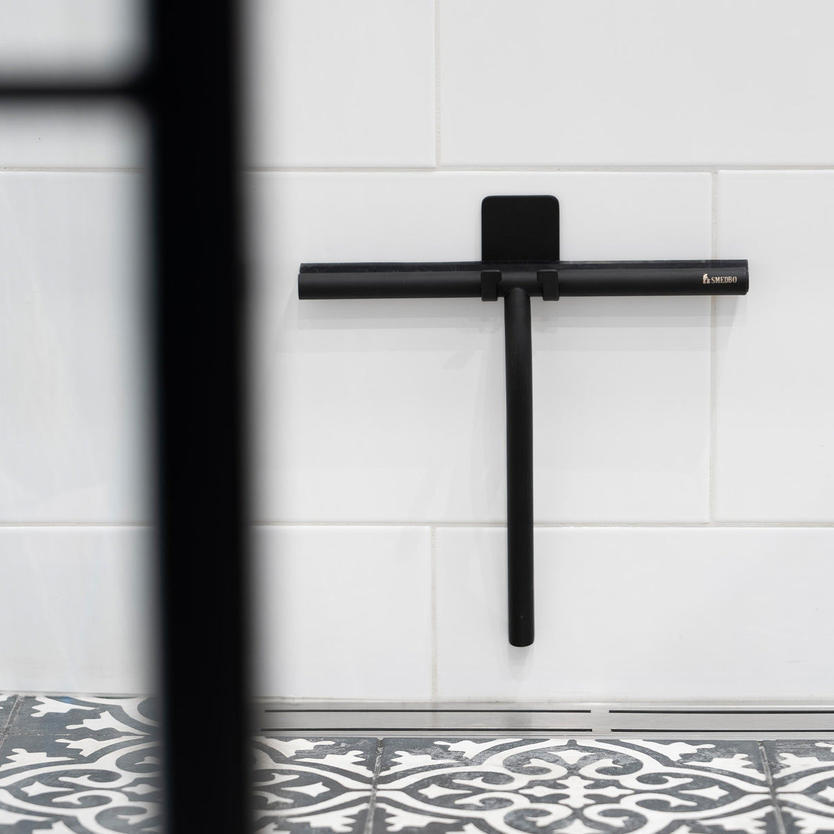 DB2140 Smedbo Sideline Matt Black Shower Squeegee with Self Adhesive Hook Installed on Tiles