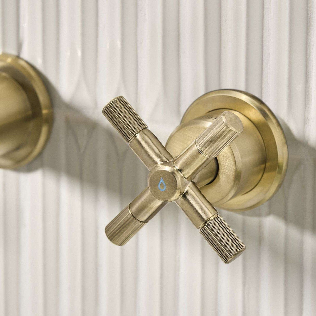 CRU3THWMBASBB Bristan Cruzar Brushed Brass 3TH Wall Mounted Basin Mixer Cold Handle Close Up