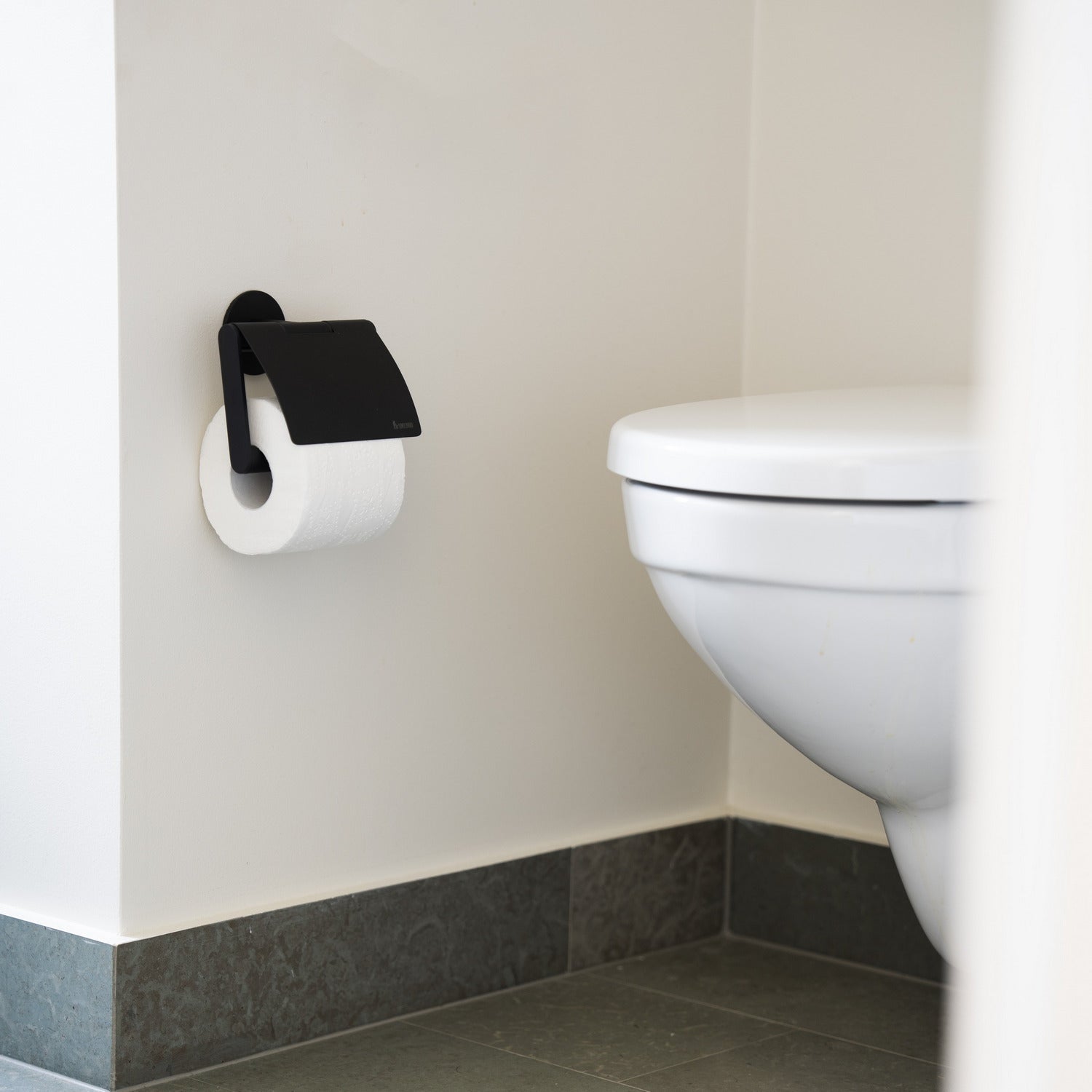 TB3414 Smedbo Dot Black Self Adhesive Toilet Roll Holder with Lid Lifestyle