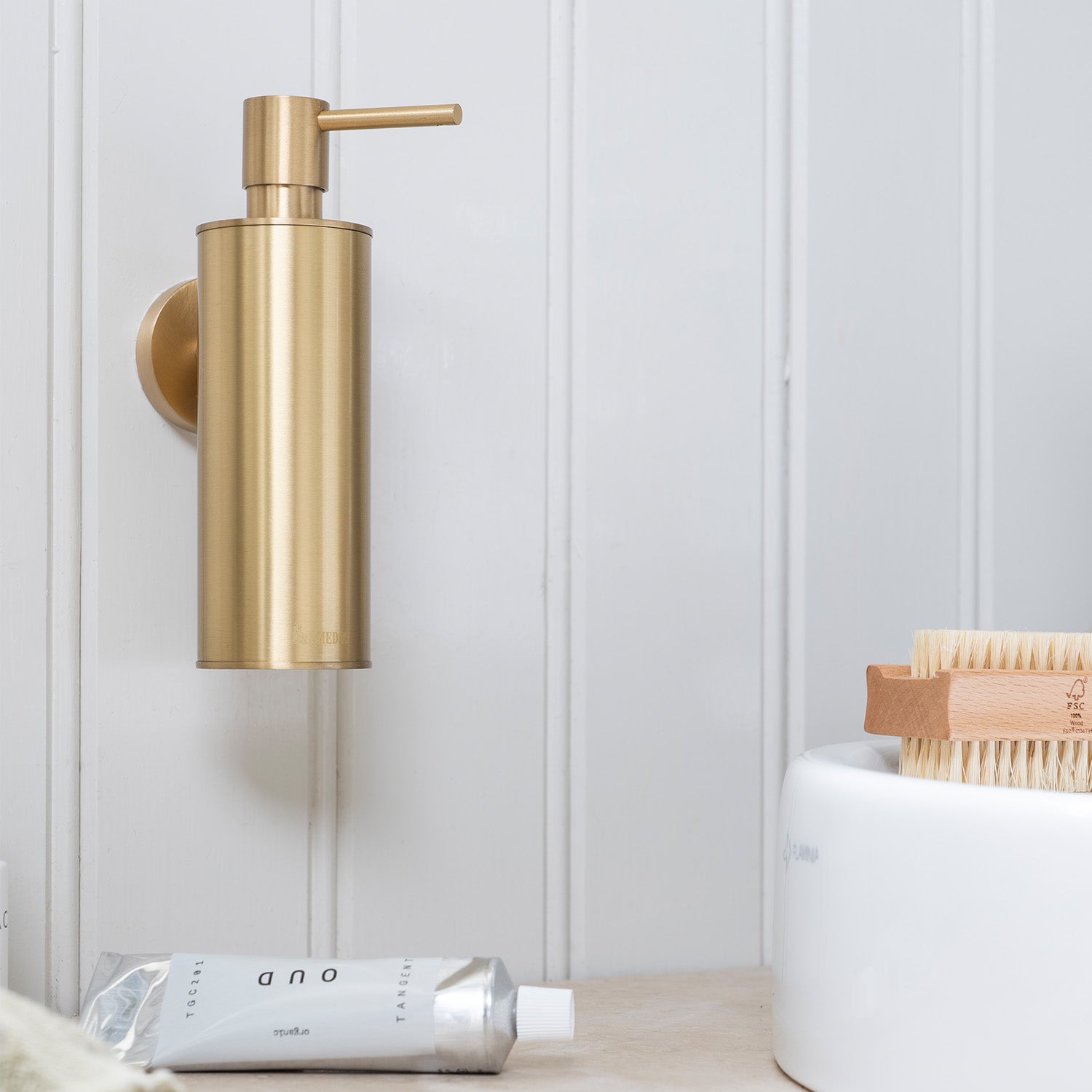 Smedbo Home Wall Mounted Soap Dispenser in Brushed Brass lifestyle