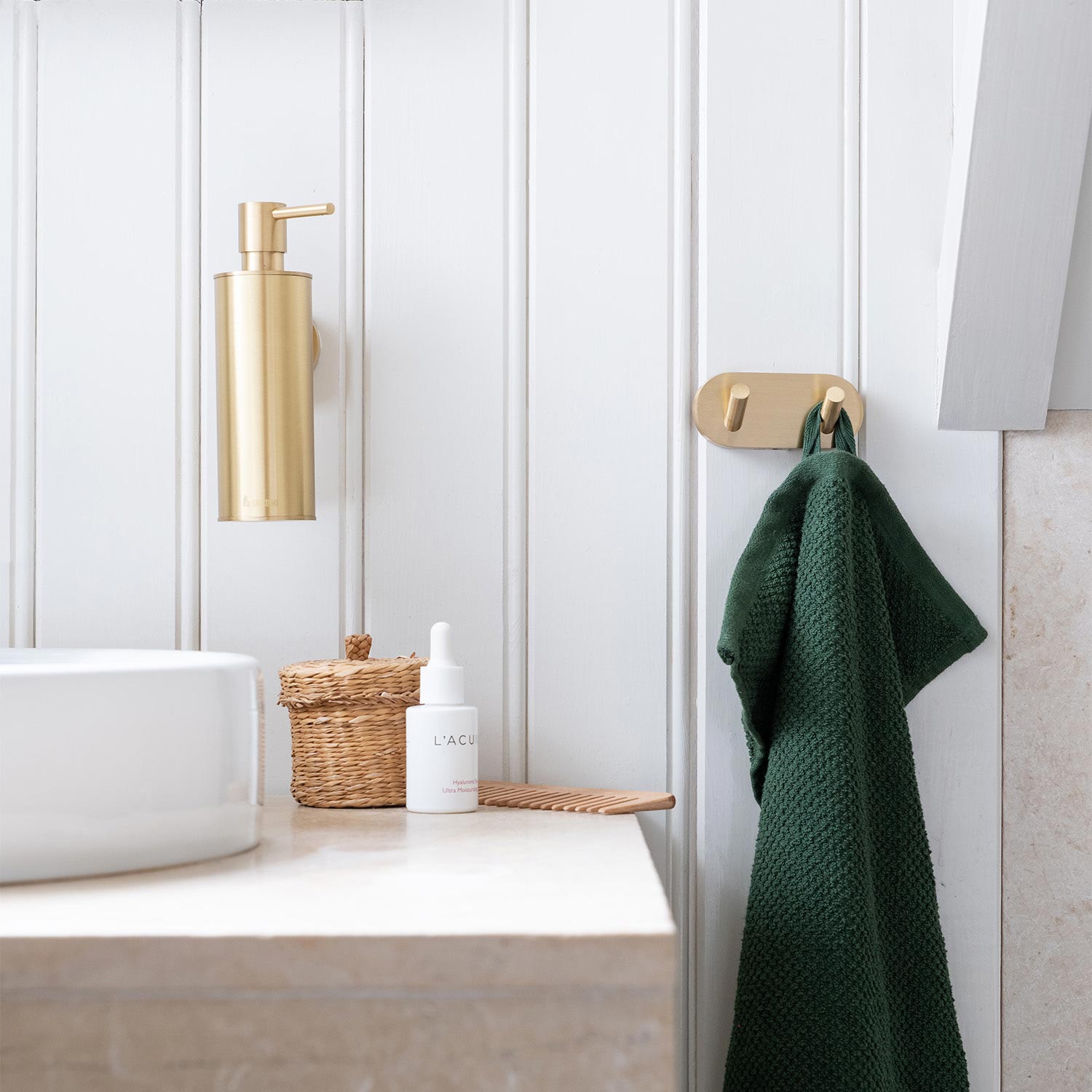 Smedbo Home Wall Mounted Soap Dispenser in Brushed Brass lifestyle 2