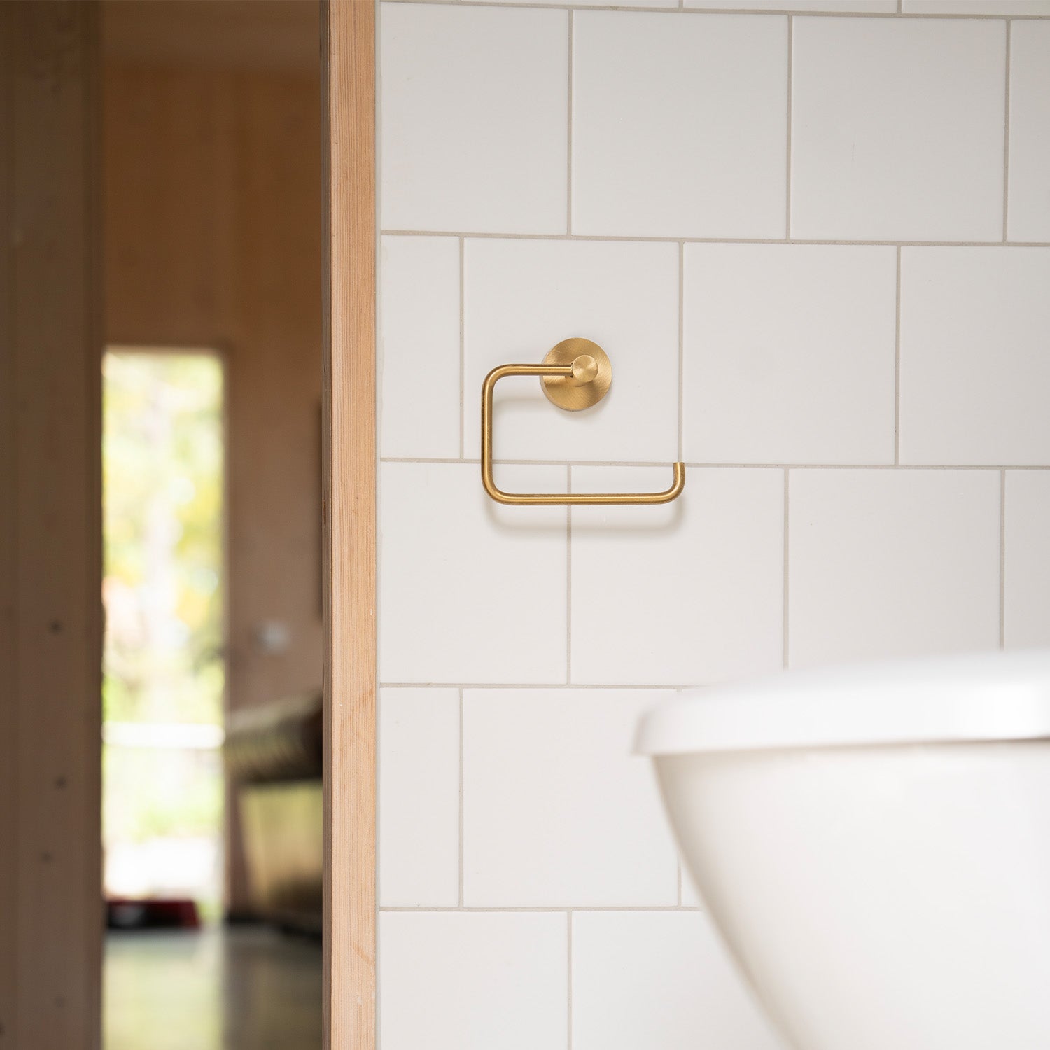 Smedbo House Toilet Roll Holder in Brushed Brass lifestyle 2