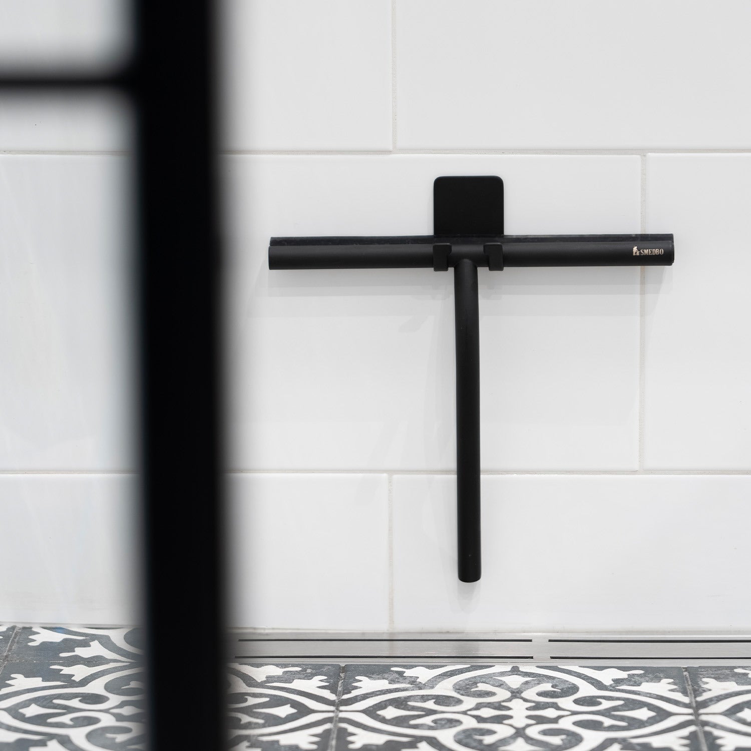 DB2140 Smedbo Sideline Matt Black Shower Squeegee with Self Adhesive Hook Installed on Tiles
